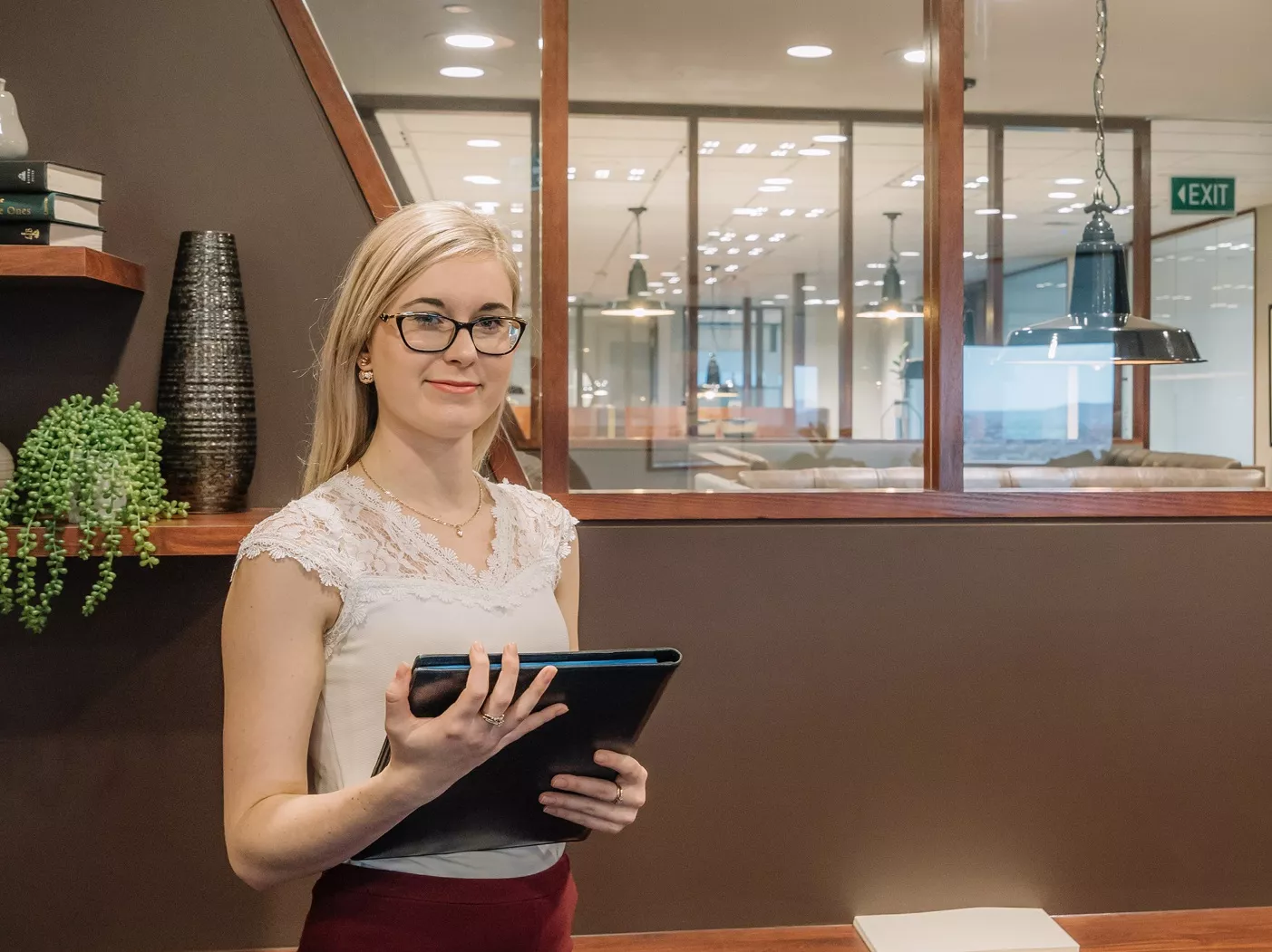 Reception and coworking lounge at Servcorp Bastion Tower, Leopold Quarter—welcoming support, modern design, and productive workspace