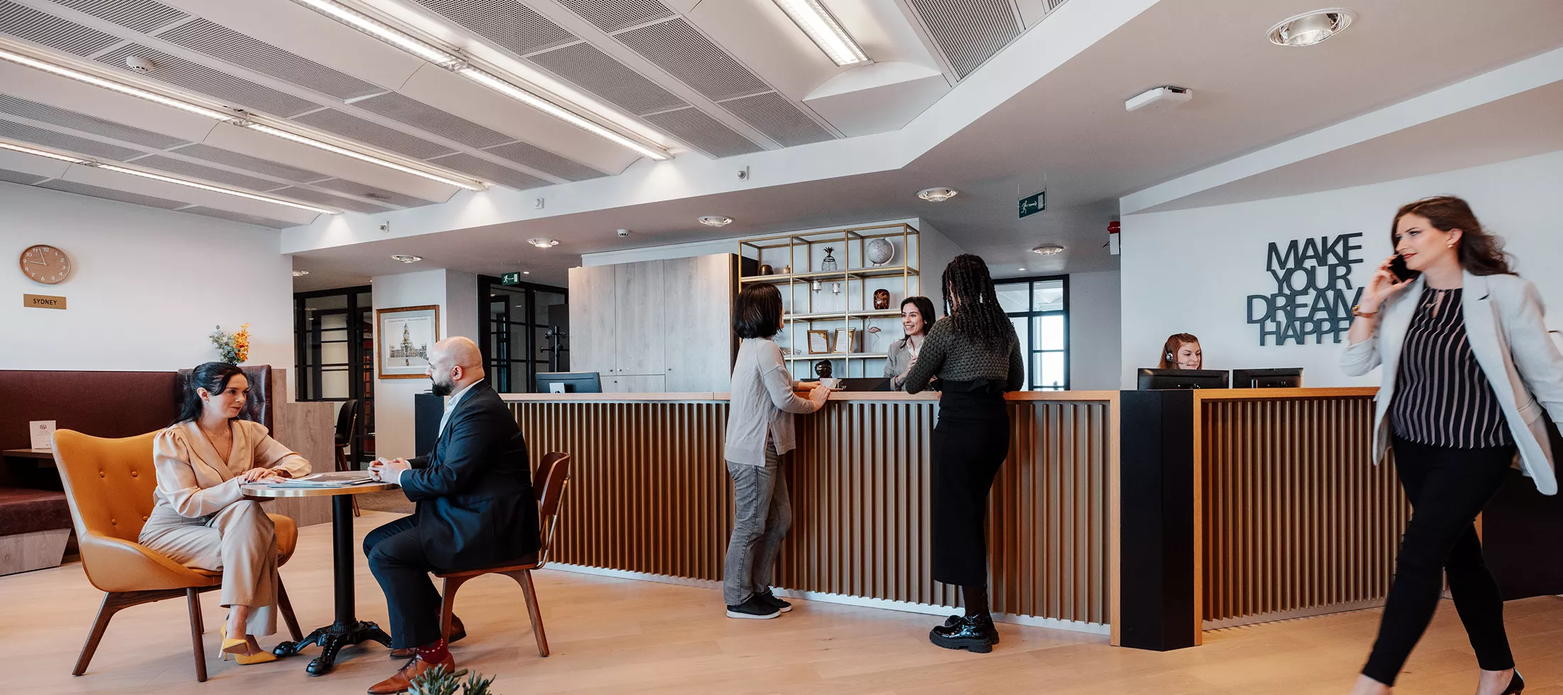 Reception and coworking lounge at Servcorp Bastion Tower, Leopold Quarter—welcoming support, modern design, and productive workspace.